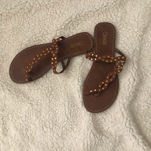 Carlos Santana flip flops